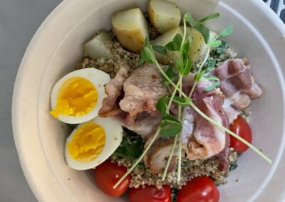 Brunch Bowl on a white plate with eggs